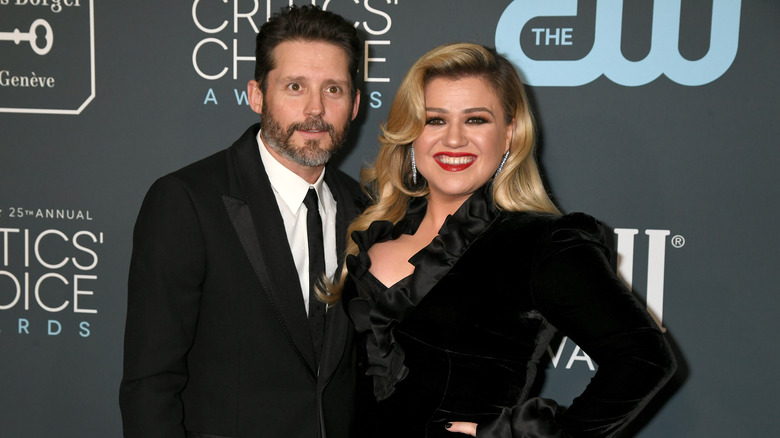 Kelly Clarkson and Brandon Blackstock pose