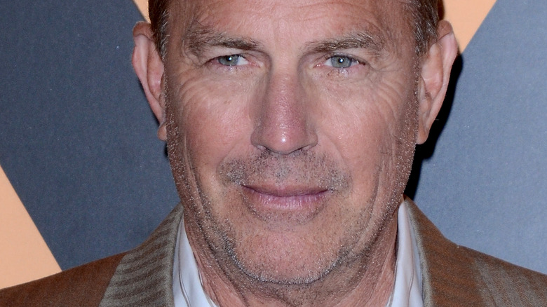 kevin costner stubble green eyes