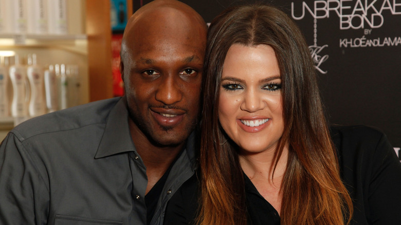 Khloe Kardashian and Lamar Odom smiling together in 2012