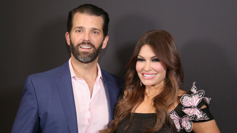 Don Jr. and Kimberly Guilfoyle posing at an event