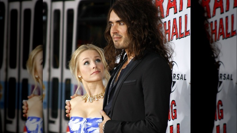 Kristen Bell looking up at Russell Brand