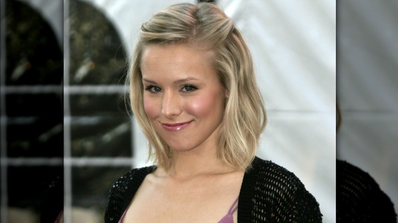 Kristen Bell smiling mischeviously