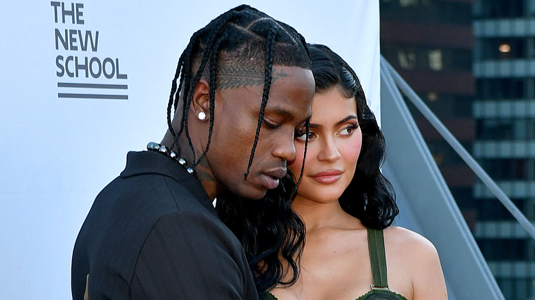 Travis Scott and Kylie Jenner posing