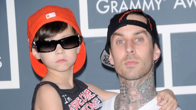 Landon and Travis Barker pose together