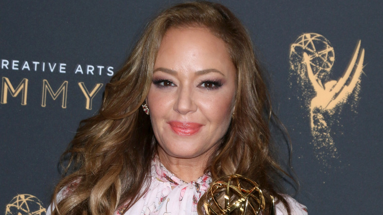 Leah Remini holding her Emmy award in 2017.