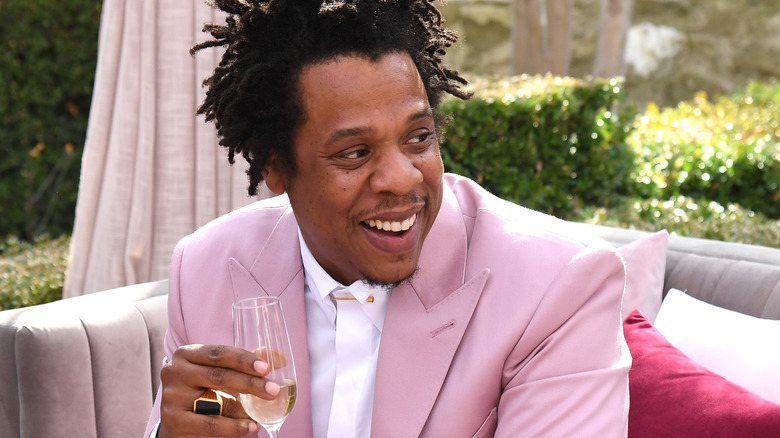 Jay-Z wearing a pink suit 