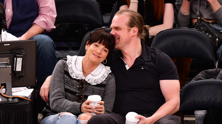 Lily Allen and David Harbour sitting together