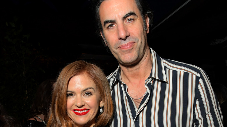 Isla Fisher and Sacha Baron posing for cameras 