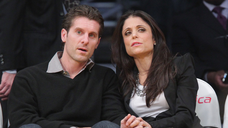 Bethenny Frankel and Jason Hoppy at an NBA game