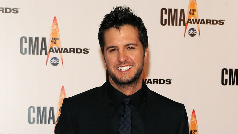 Luke Bryan in black suit 