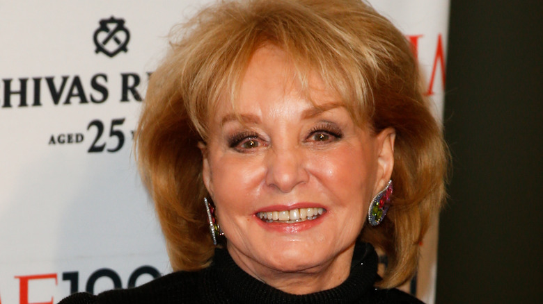 Barbara Walters smiling on step and repeat in 2014