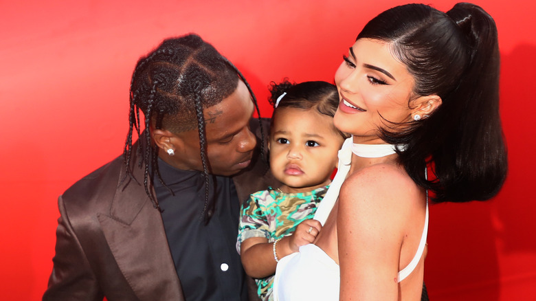 Travis Scott, Kylie Jenner, and Stormi Webster on the red carpet