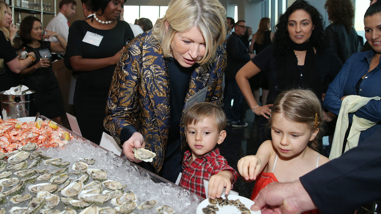 Martha Stewart eats oyster with grandkids