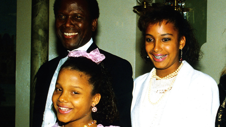 Sidney Poitier with two of his daughters in the 1982. 