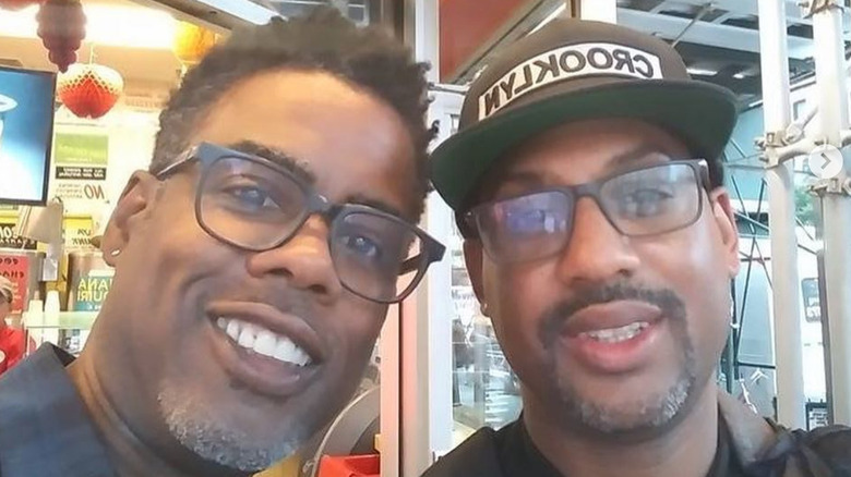 Chris Rock and Kenny Rock smile for a selfie