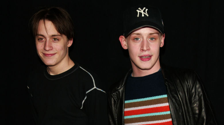 Kieran and Macaulay Culkin pose at a 2002 premiere