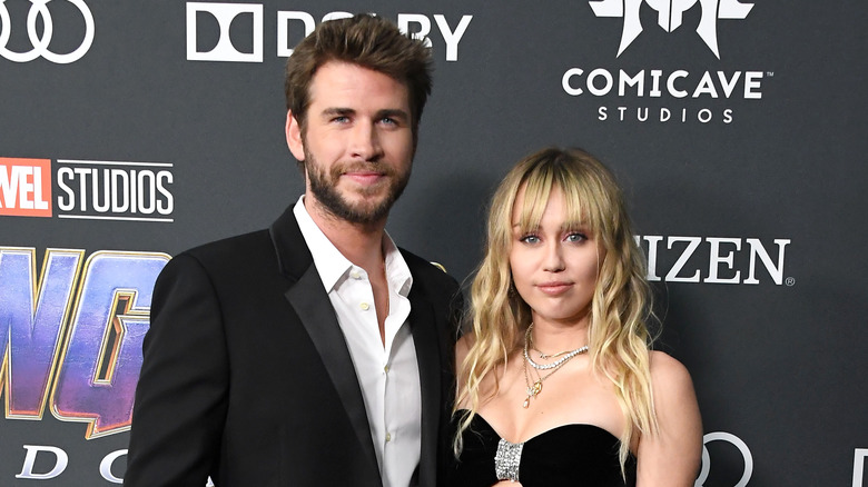 Miley Cyrus and Liam Hemsworth at The Avengers premiere