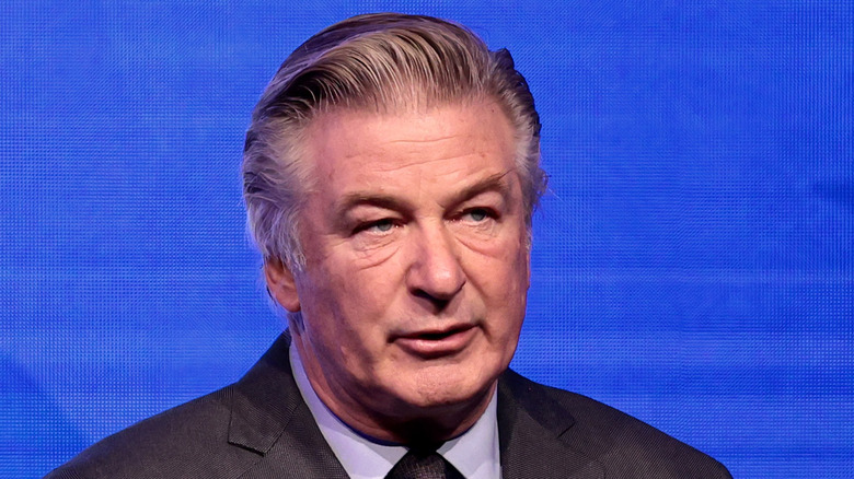 Alec Baldwin wearing suit