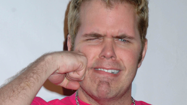 Perez Hilton mock-frowning on red carpet