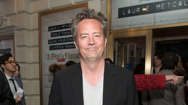 Matthew Perry smiling in London