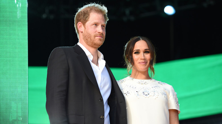 Prince Harry and Meghan Markle smiling