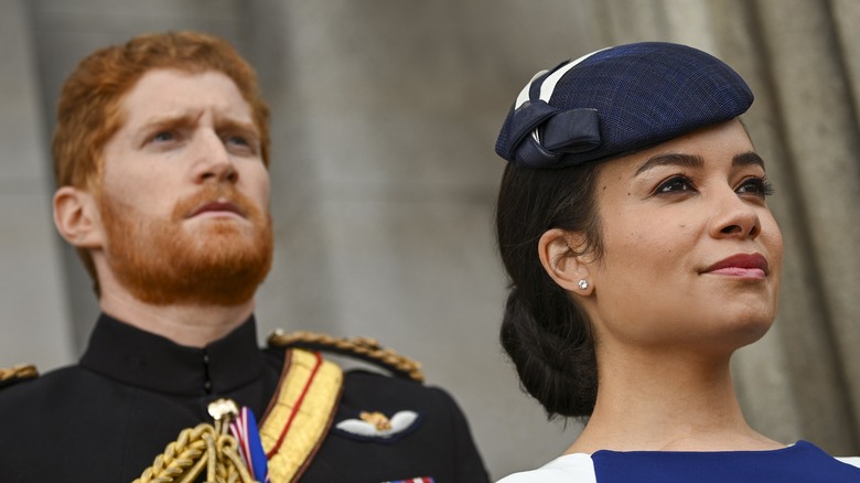 Jordan Dean as Prince Harry and Sydney Morton as Meghan Markle in Harry & Meghan: Escaping the Palace