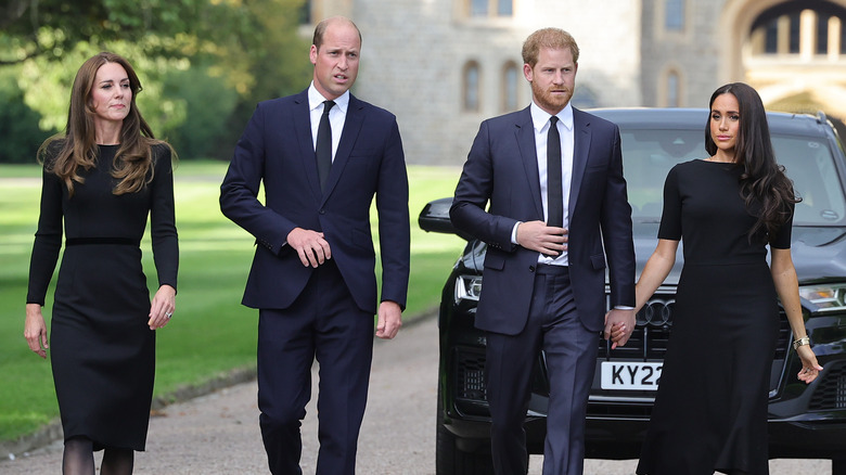 Kate Middleton, Prince William, Prince Harry and Meghan Markle walking