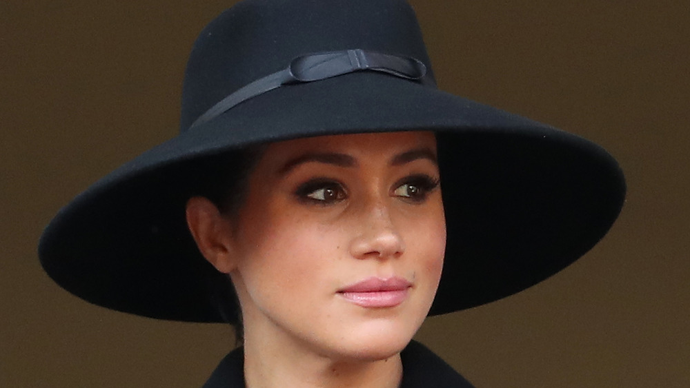 Meghan Markle with black hat