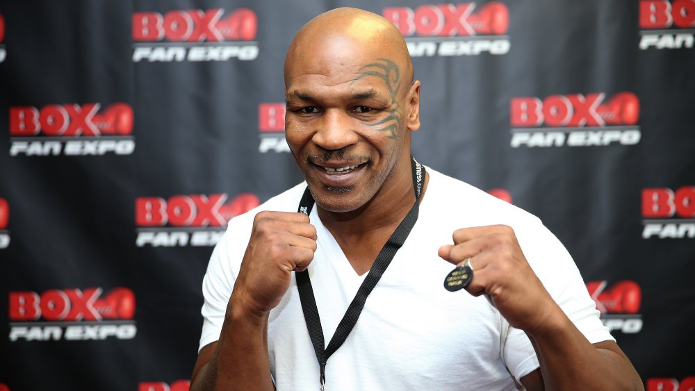 Mike Tyson with fists up, posing