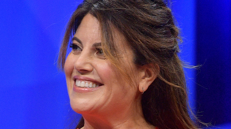 Monica Lewinsky flashes a smile on stage