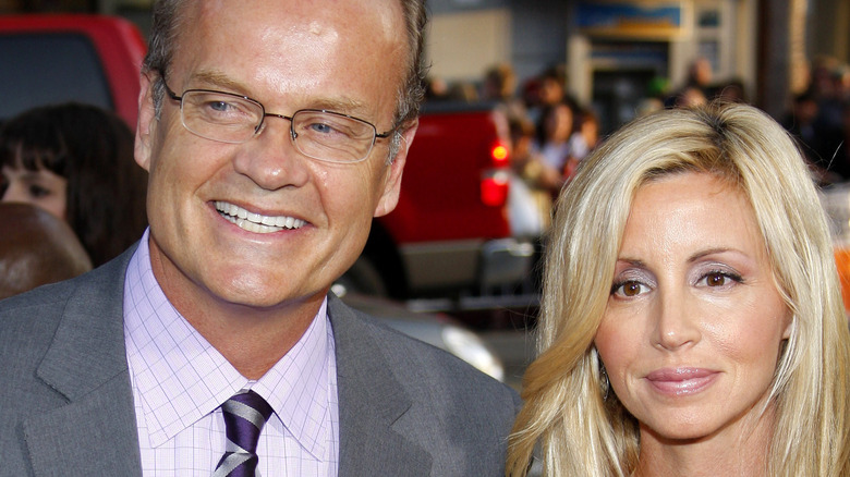 Kelsey Grammer poses alongside Camille Grammer at a premiere