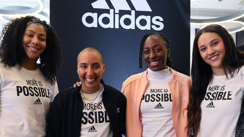 WNBA Adidas partners posing for picture
