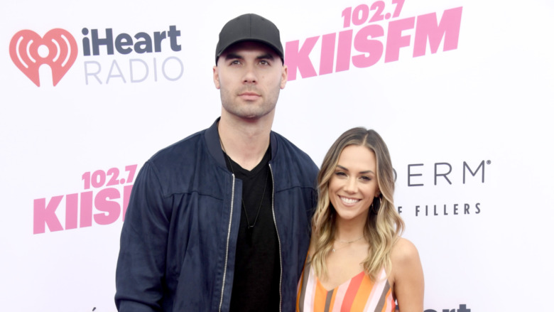 Mike Caussin and Jana Kramer attending 2019 iHeartRadio Wango Tango