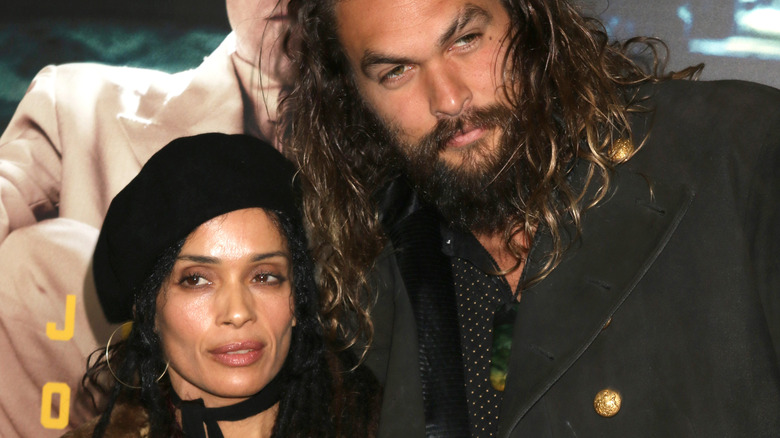 Lisa Bonet and Jason Momoa posing