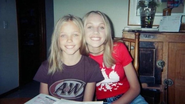 Young Kat Timpf smiling with sister