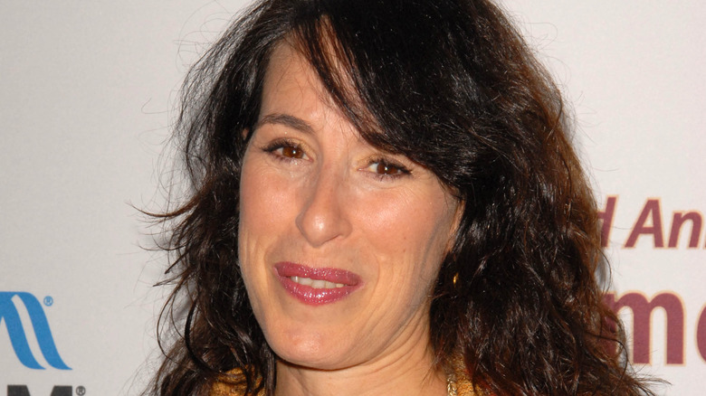 Maggie Wheeler slightly smiling