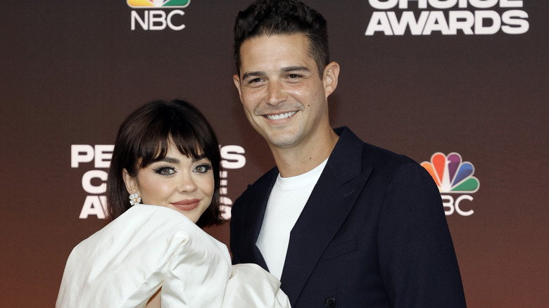 Sarah Hyland and Wells Adams smiling