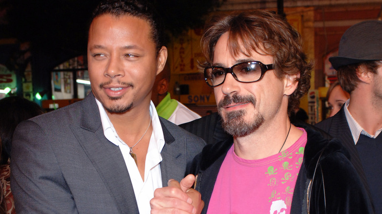 Terrence Howard and Robert Downey Jr smiling
