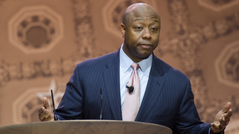 Tim Scott speaking with hands raised