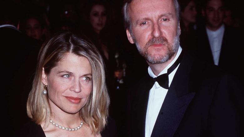 James Cameron and Linda Hamilton on red carpet 