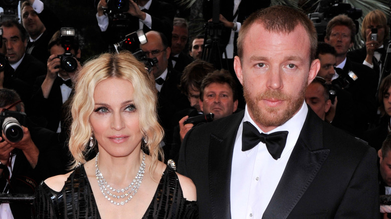 Madonna and Guy Ritchie on the red carpet at an event