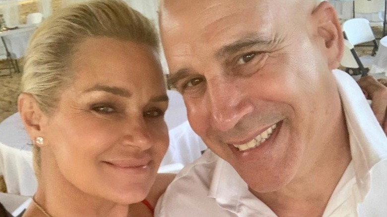 Yolanda Foster smiling next to grinning Joey Jingoli