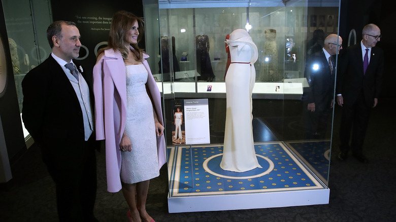 Hervé Pierre Braillard and Melania Trump looking on