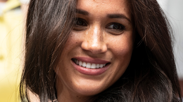 Meghan Markle smiling at 2019 US Open