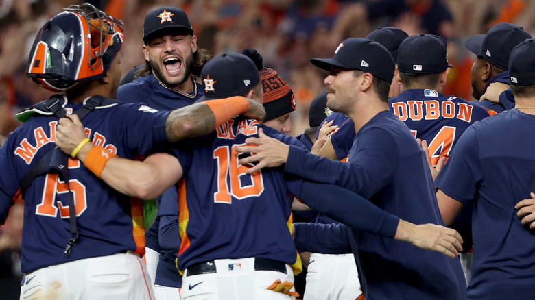 The Houston Astros celebrating on the field