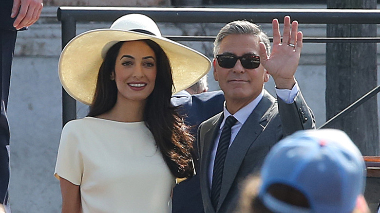 Amal Alamuddin and George Clooney on their wedding day