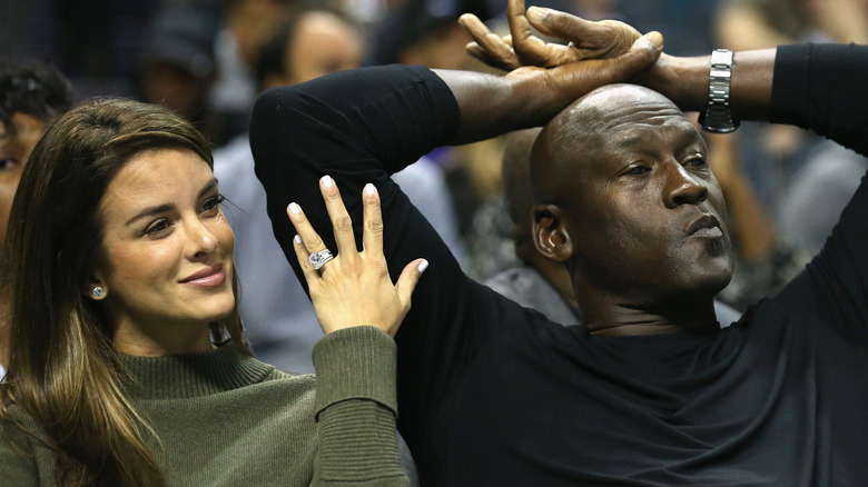 Yvette Prieto and Michael Jordan sitting together