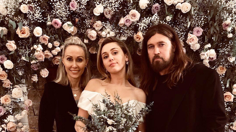 TIsh Cyrus, Miley Cyrus, and Liam Hemsworth