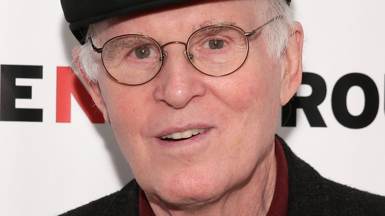 Charles Grodin smiles on the red carpet