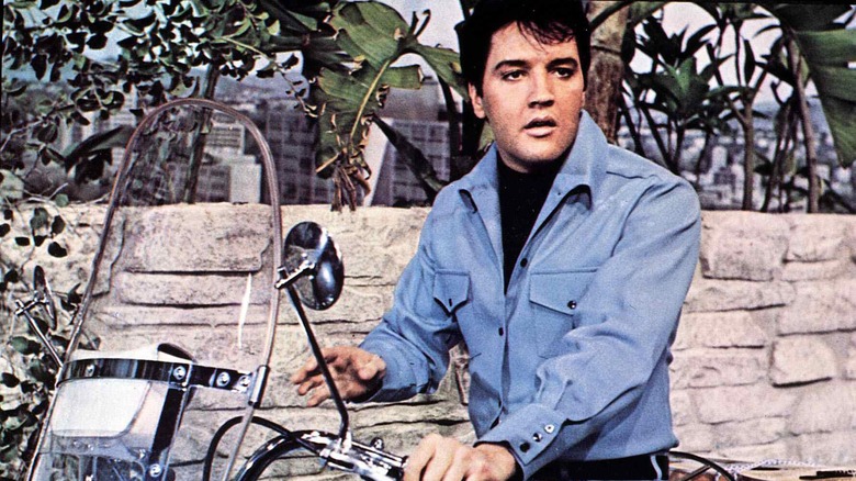 Elvis Presley in blue shirt